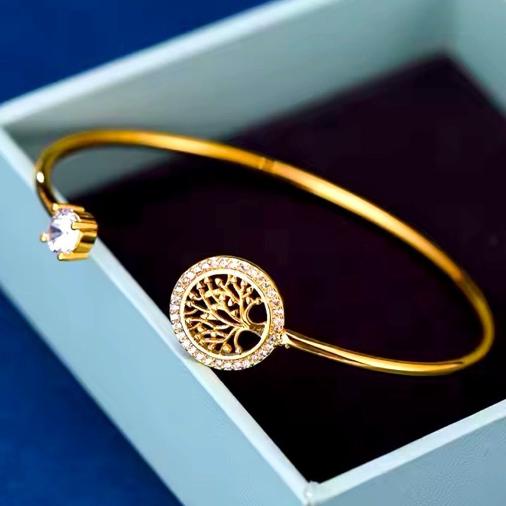 Elegant Gold adjustable tree of life bracelet with crystal accent